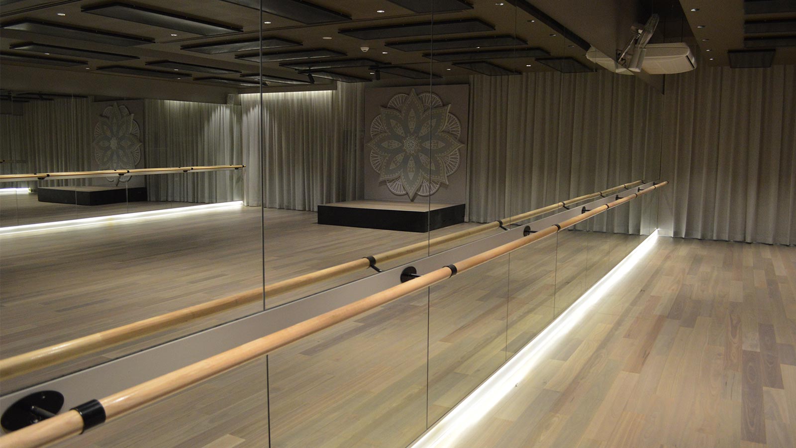 The barre against themirrors with mandala in the background